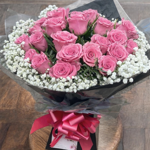 pink rose bouquet with gypsophila