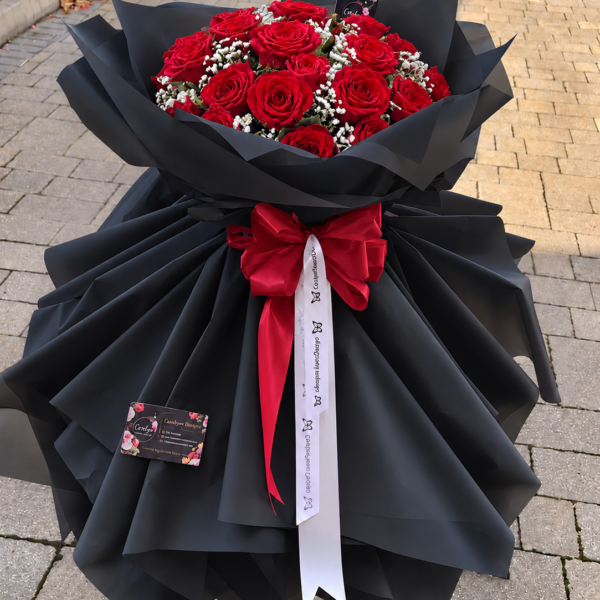Luxurious red rose and baby's breath bouquet in Thurrock