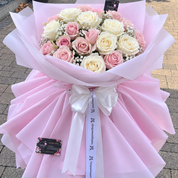Rose skirt bouquet with 25 roses and delicate greenery